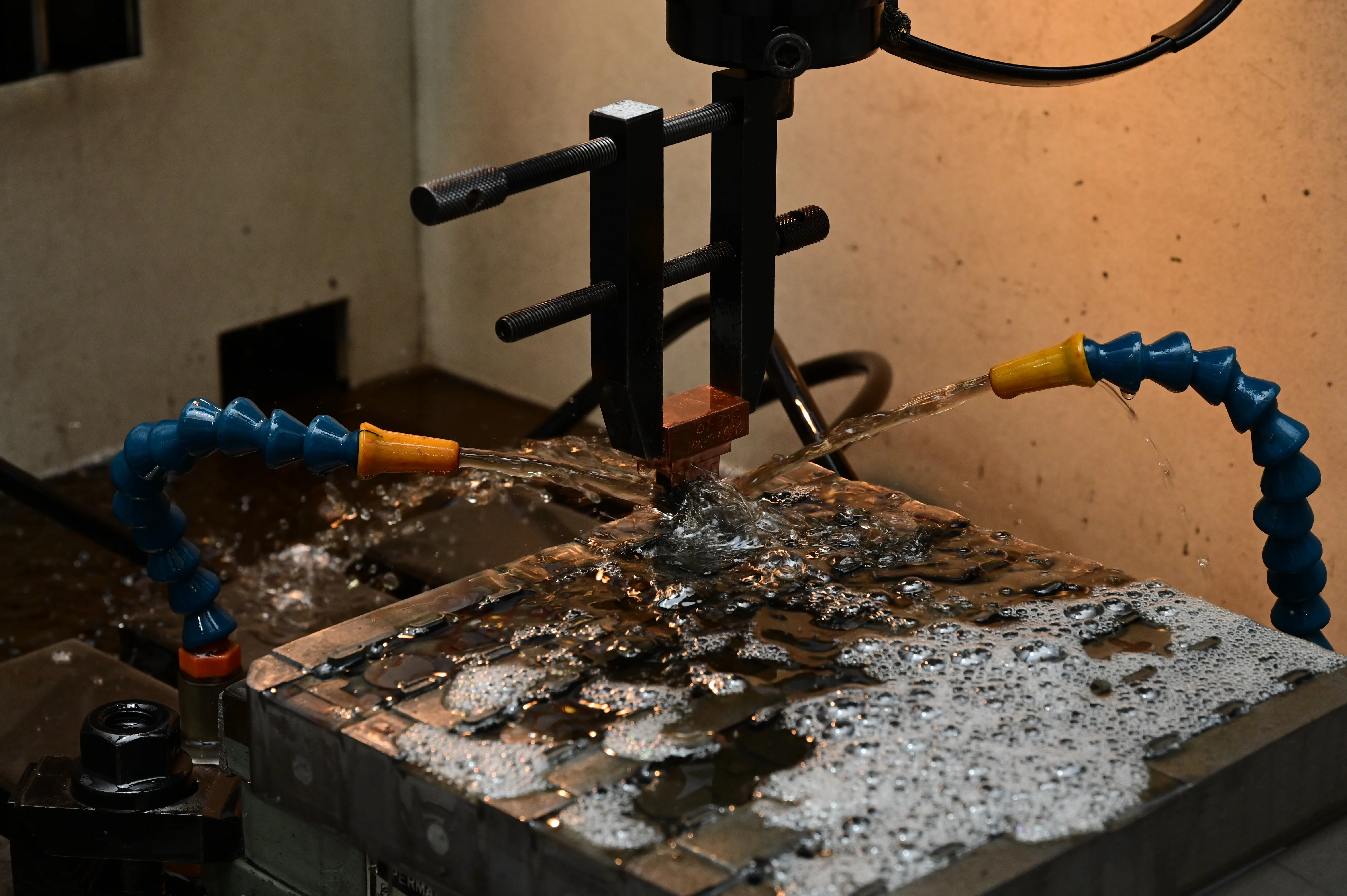 Custom fabricated metal parts showing detailed finishing and quality